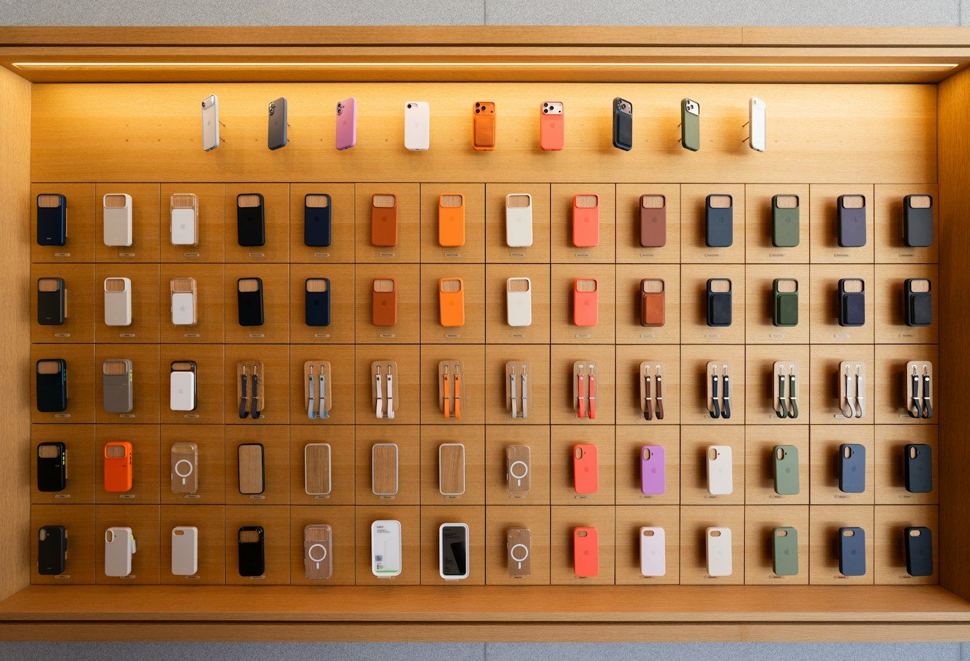 Phone cases displayed on a retail wall